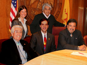 Governor Richardson Signs the Title Insurance Reform Bill. Pictured are Kristina Fisher, Regis Pecos, Speaker Ben Lujan, Fred Nathan & Governor Richardson.